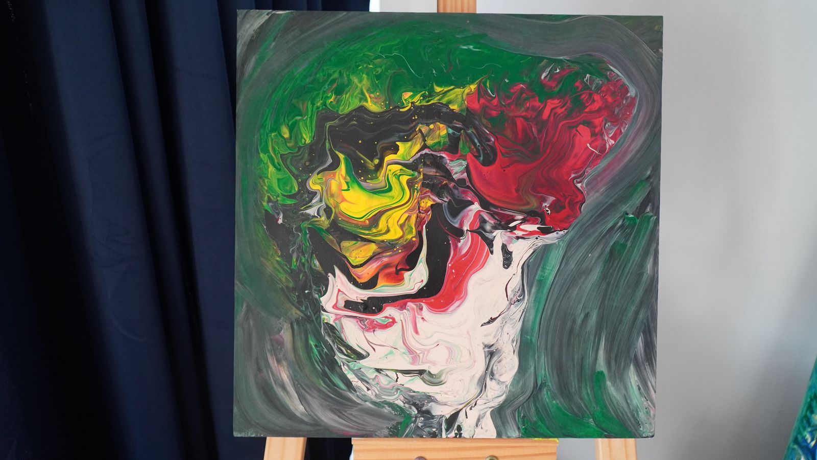 Abstract in greens, reds, and yellows