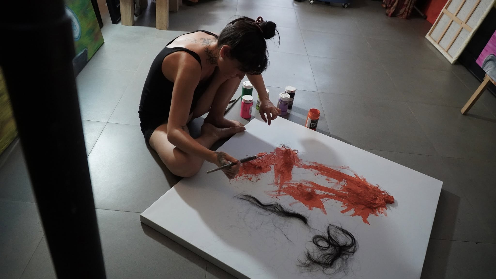 Nelly painting on canvas on the floor