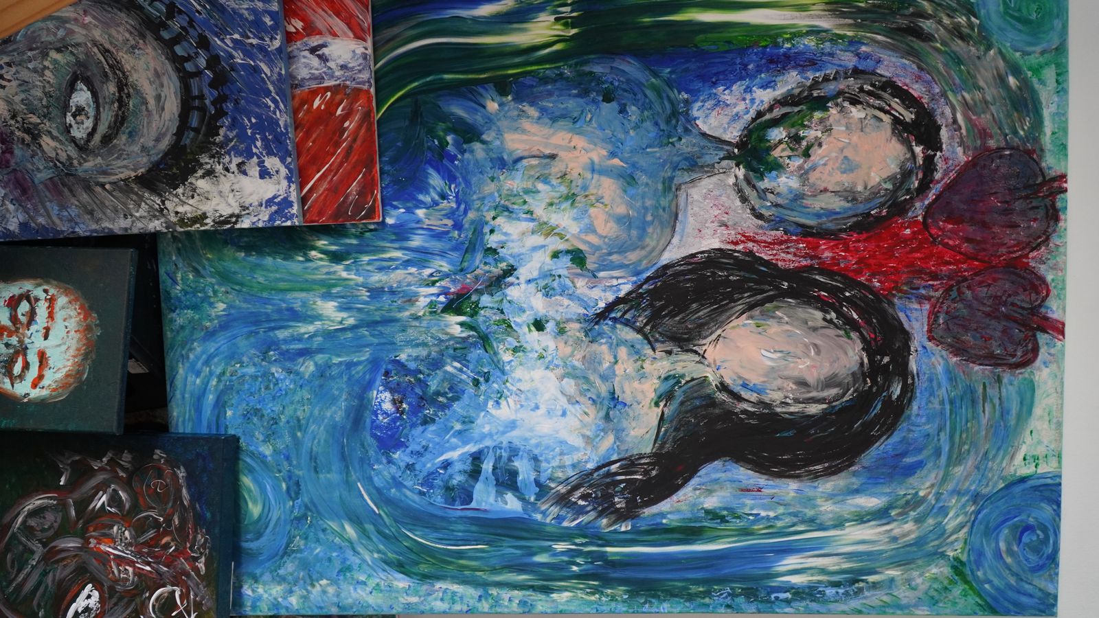Paintings arranged together